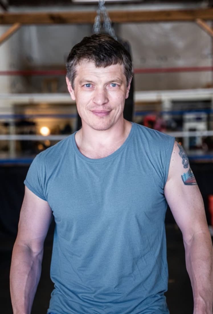 Mikhail Basharymov, boxing coach, in the gym